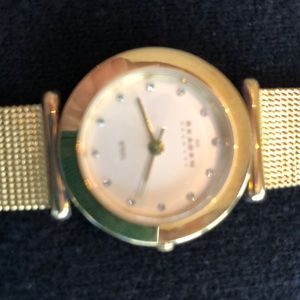 Skagen gold color watch with clear stones